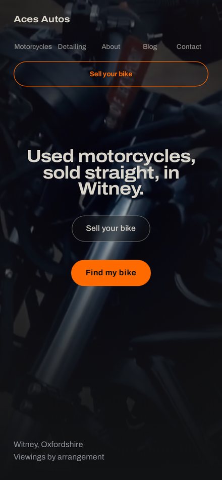 Aces Autos Motorcycles website shown on a mobile phone